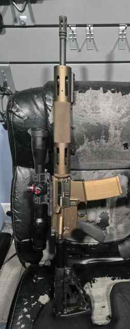 Bushmaster AR 15 5.56 Factory Cerakote Burnt Bronz